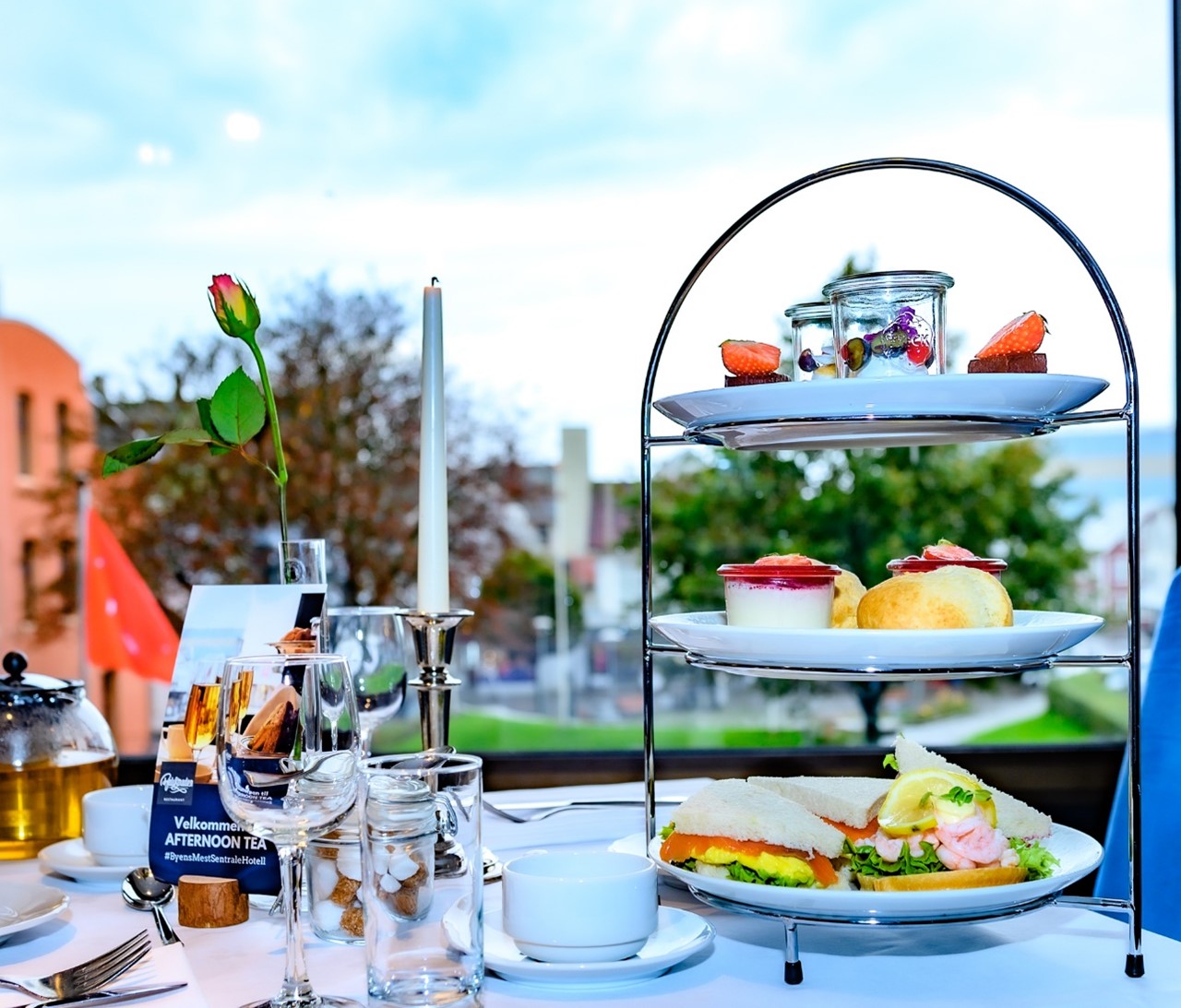 Picture of a table set with tea and baked goods