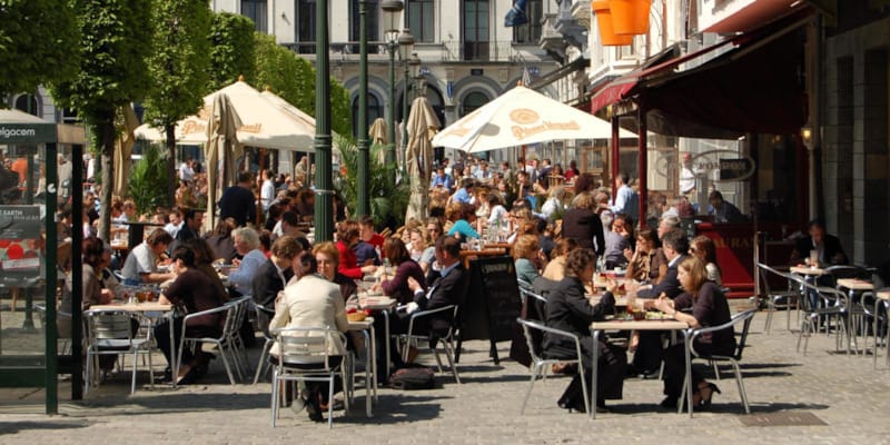 Brussels with outside restaurants and shops in summer weather