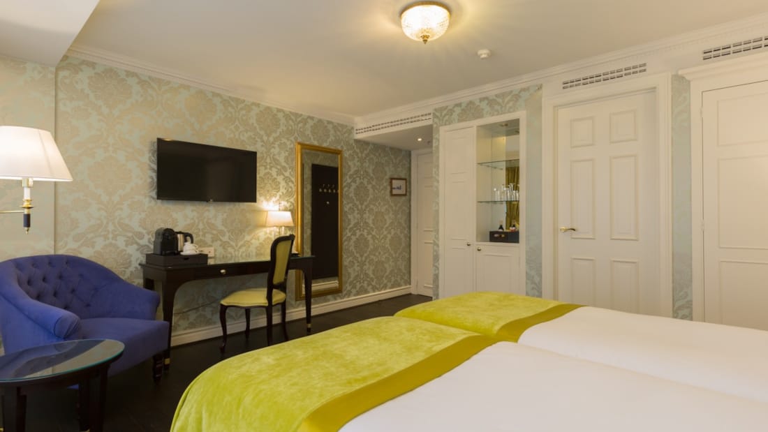 Säng i twinrom på Stanhope Hotel i Bryssel