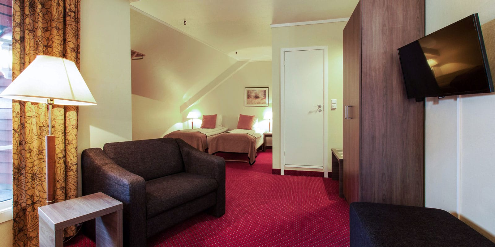 Säng i Standard Twin Room på Hotel Baronen