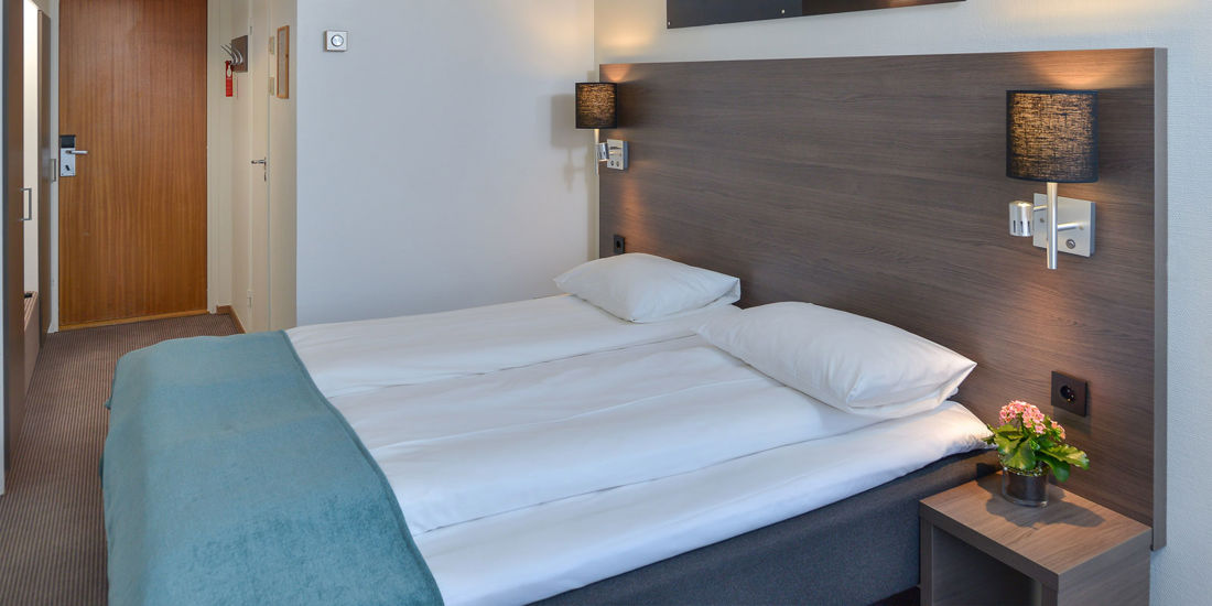 Lit dans une chambre double standard de Thon Hotel Andrikken