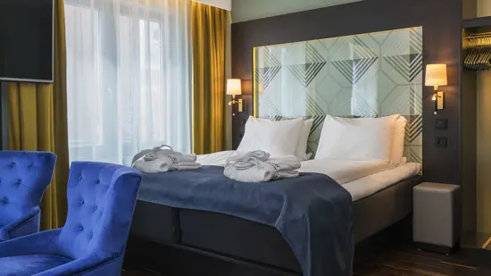 Twin room with beautiful bed