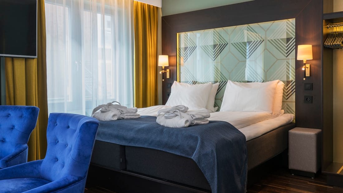Säng i Business Room på Thon Hotels Orion i Bergen