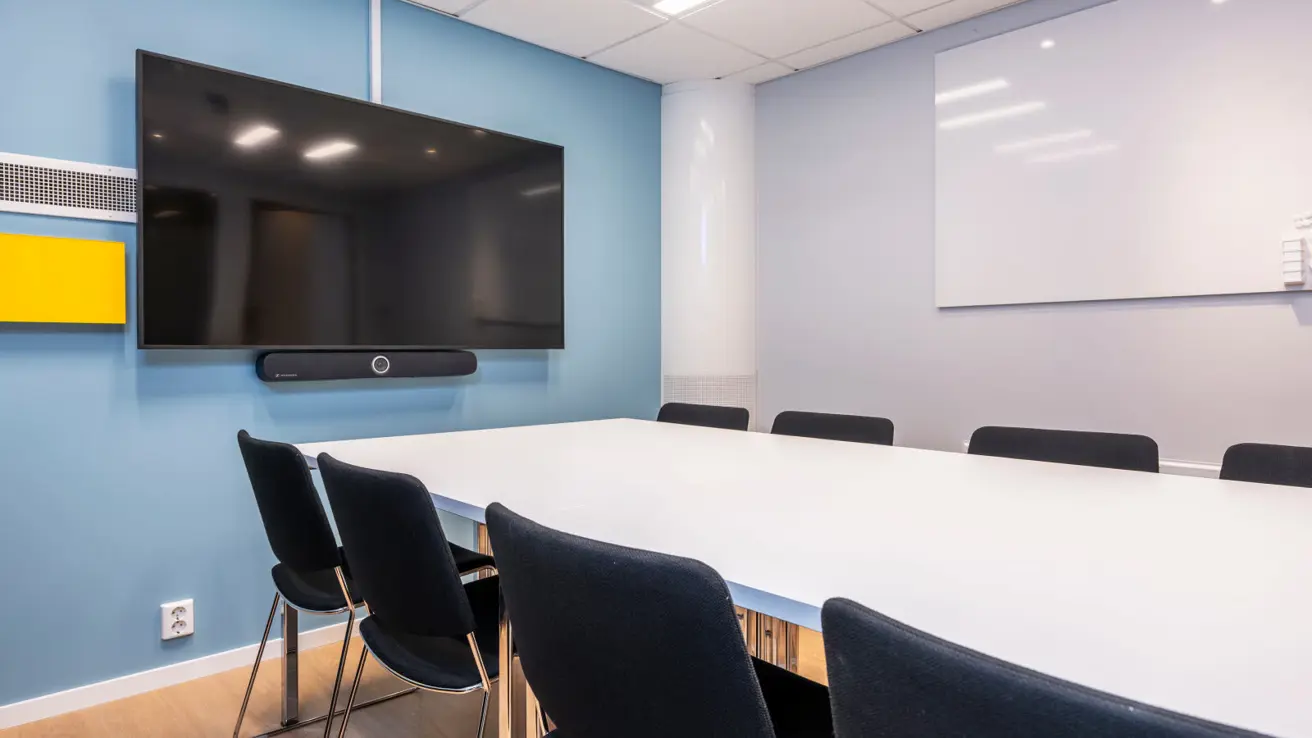 Møterom i styrebord-oppsett.