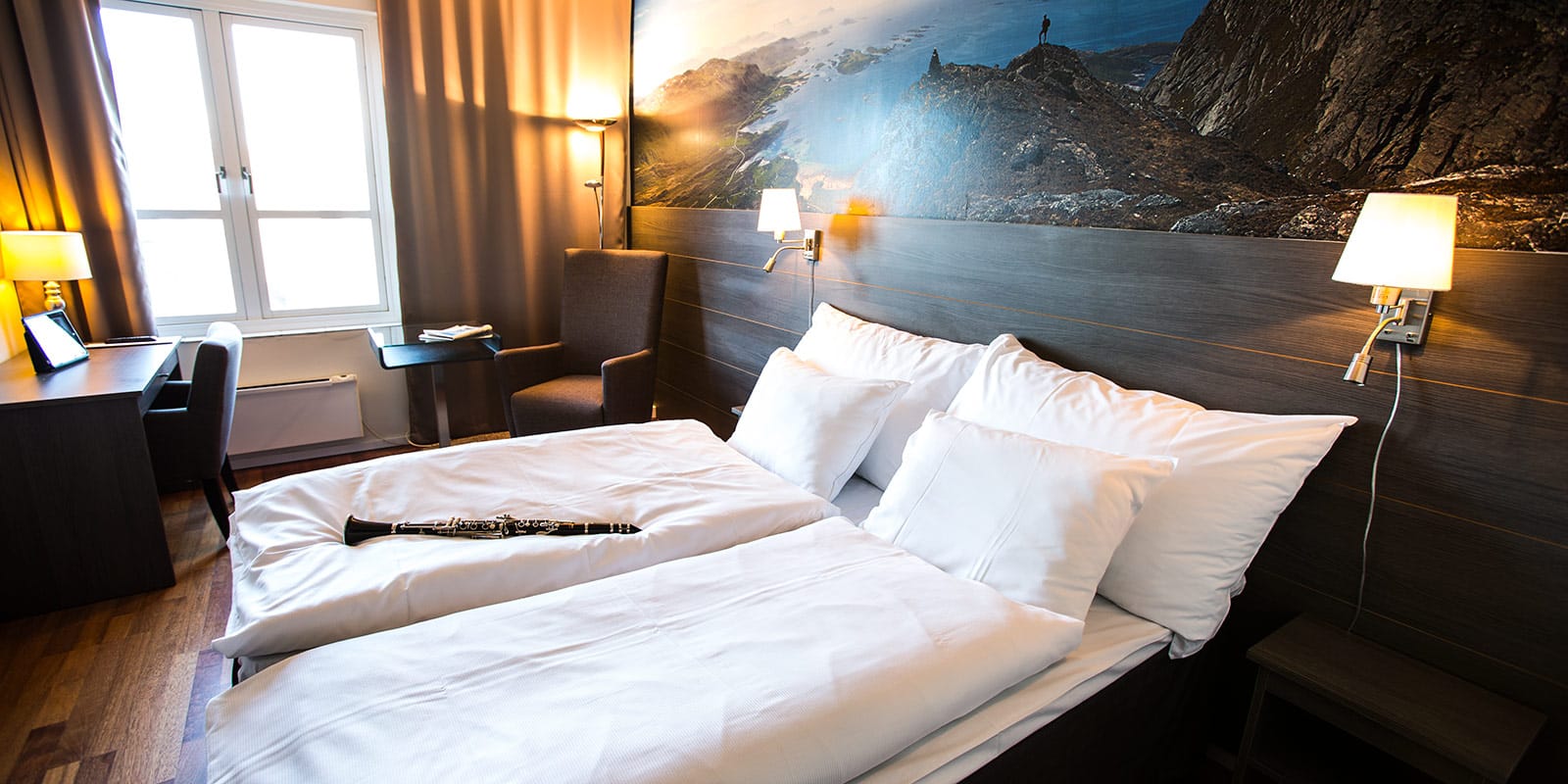Bett eines Superior Zimmers im Skagen Hotel in Bodø