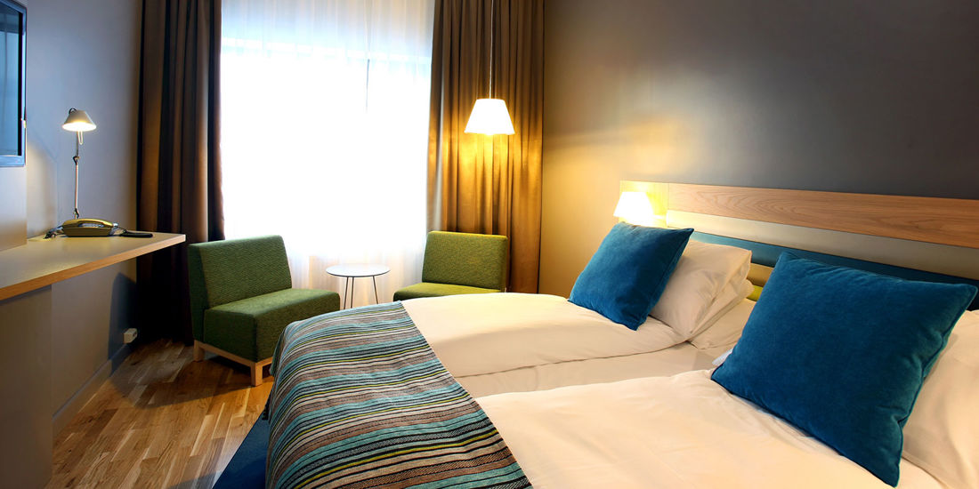 Lit dans une chambre double du Thon Hotel Brønnøysund