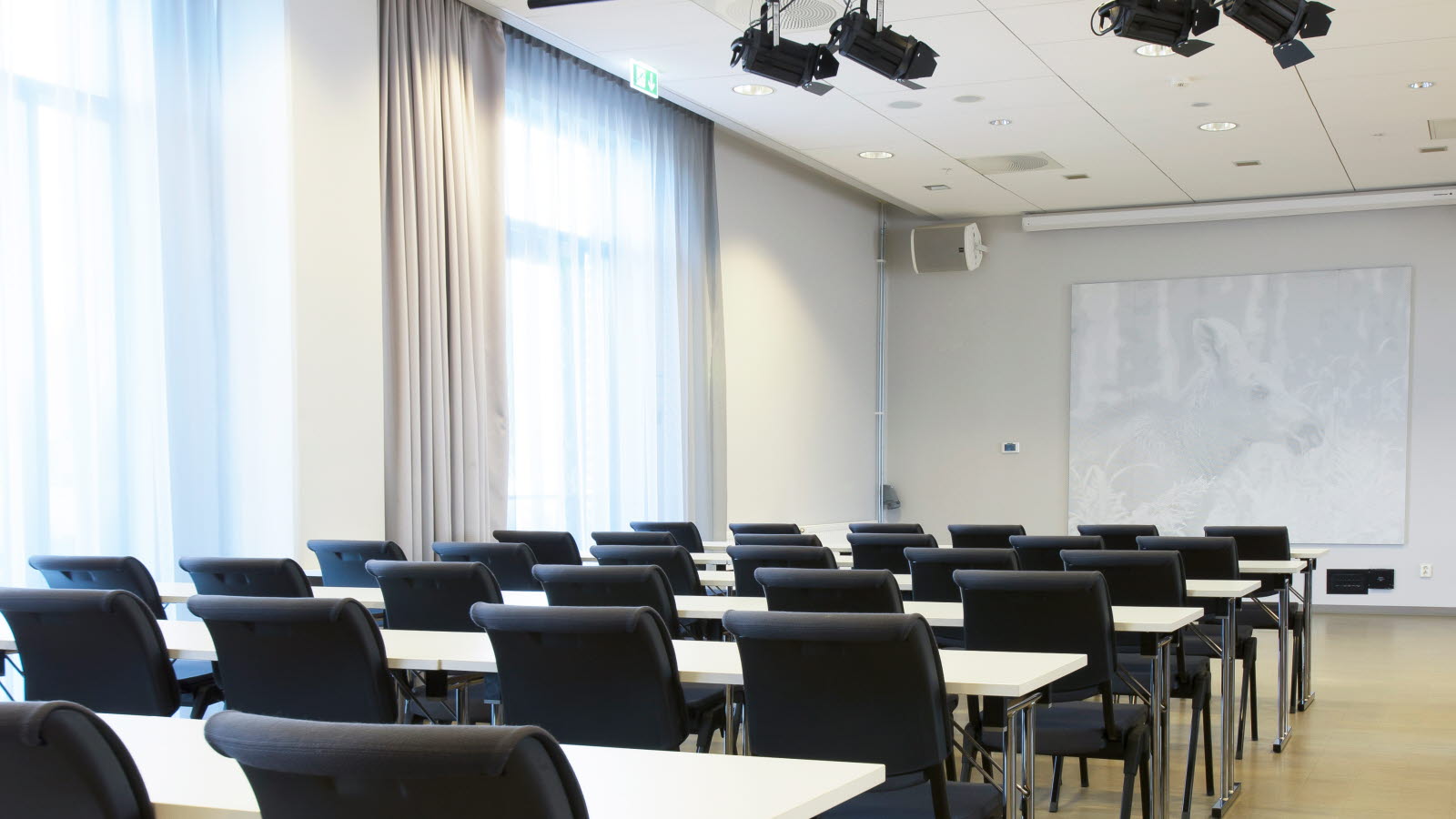 Detaljebillede af pen og notesbog