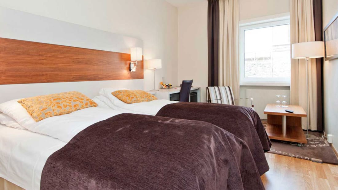 Bed in tweepersoonskamer in Thon Hotel Saga in Haugesund