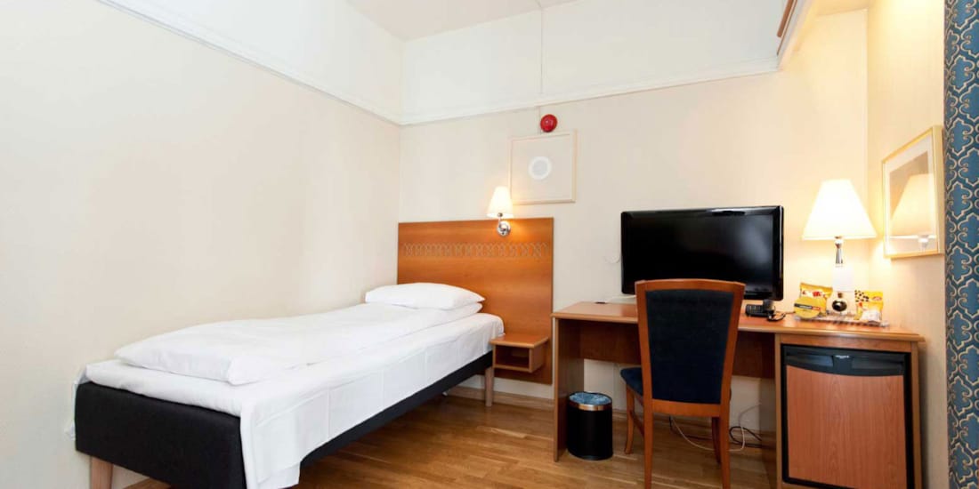 Bed in eenpersoonskamer in Thon Hotel Saga in Haugesund