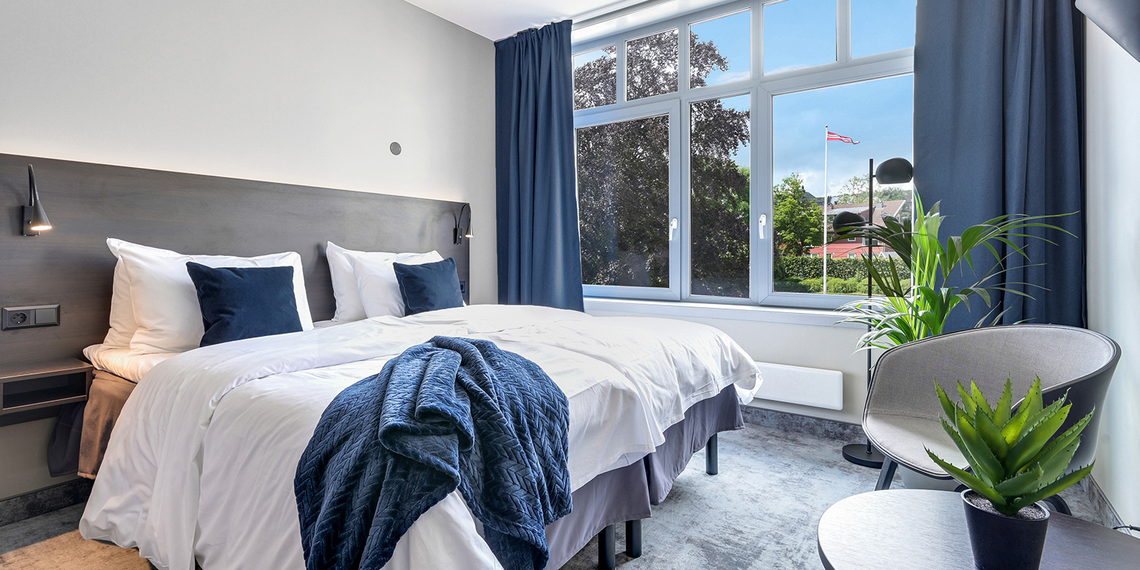 Seng i standard familierom på Hotel Horten