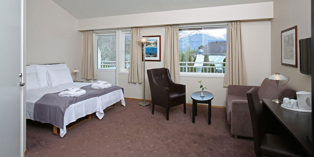 The bed in a Family room at Thon Hotel Jølster
