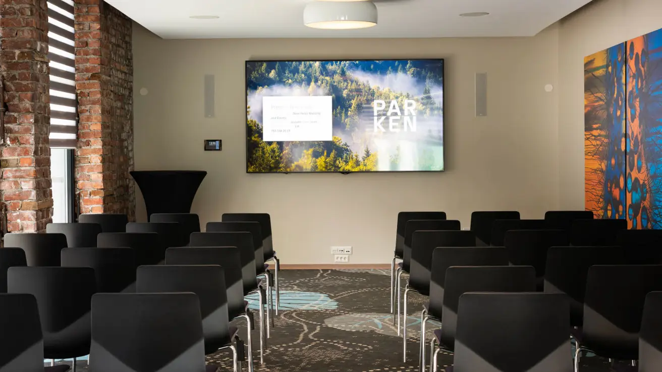 Salle de conférence avec disposition en salle de cinéma au Thon Partner Hotel Parken.
