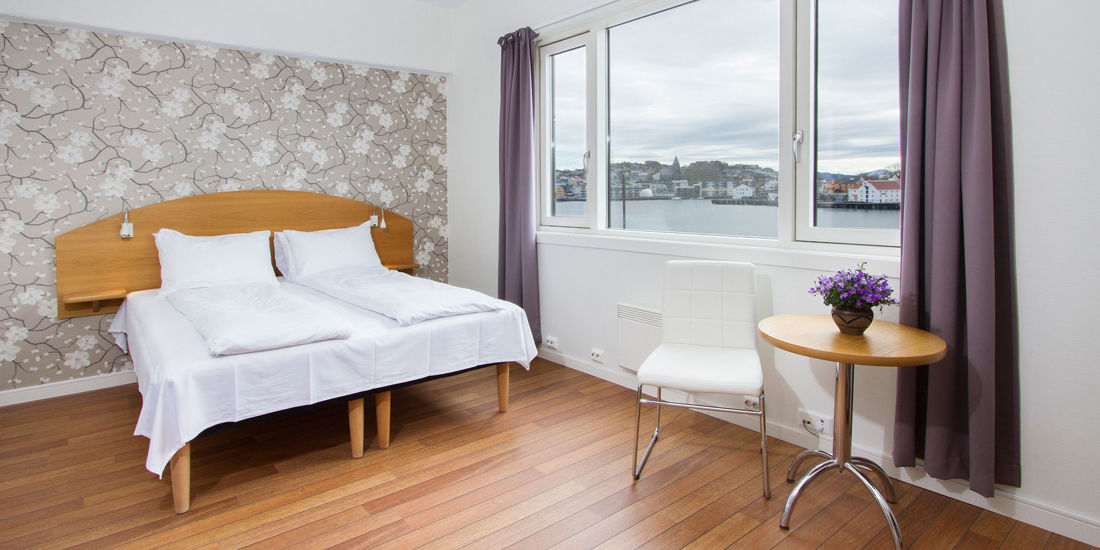 Bett im Standard-Doppelzimmer im Thon Hotel Storgata.