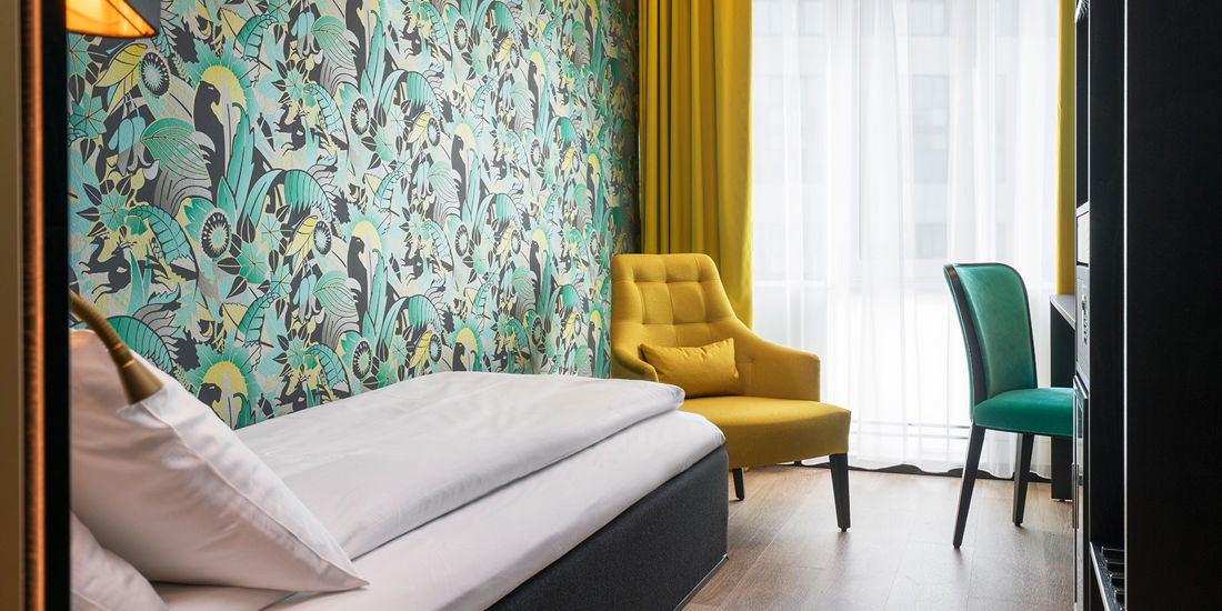 Bed in eenpersoonskamer in Thon Hotel Arena in Lillestrøm