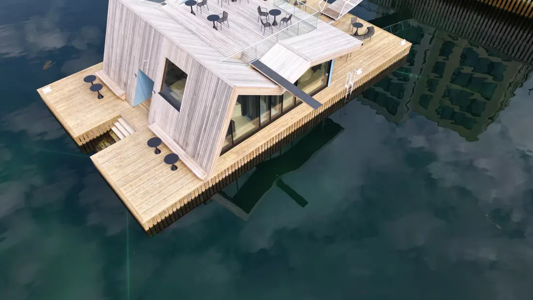 Dronebillede af sauna på flydebro