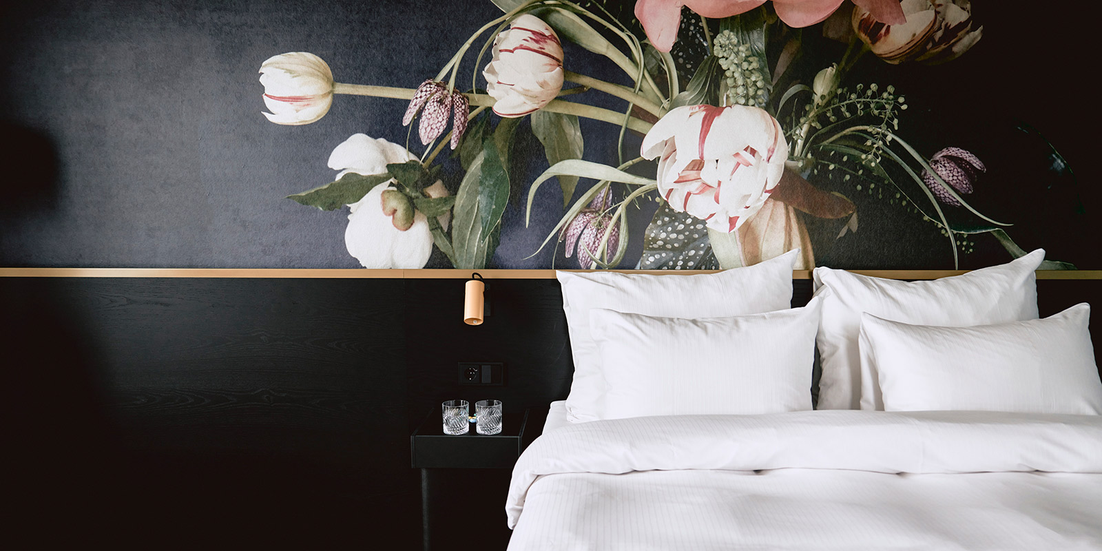 Utsnitt av suite med seng på thon hotel svolvar