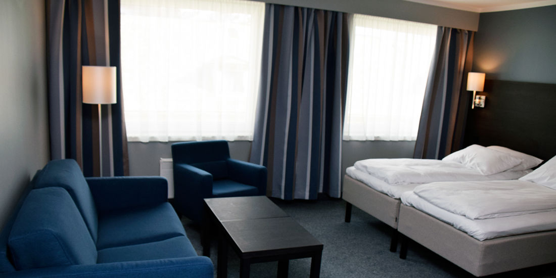 Bett im Standard-Familienzimmer im Thon Hotel Måløy