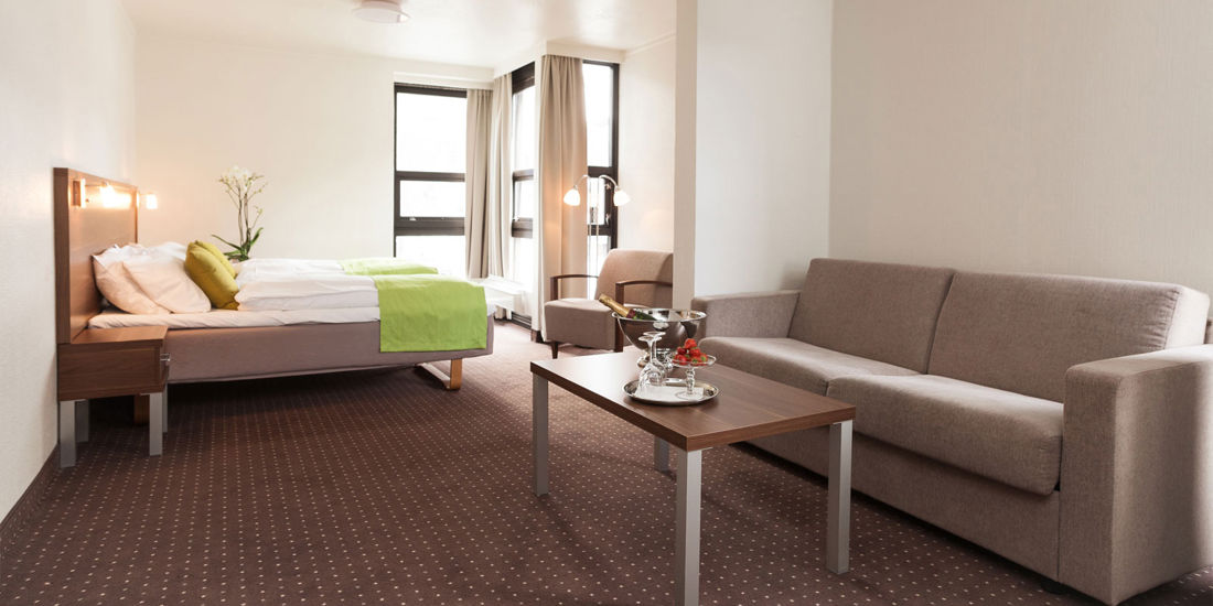 The bed in a Business room at Thon Hotel Otta