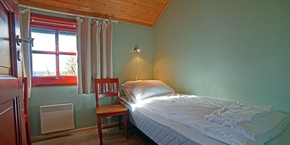 Apartment im Thon Hotel Skeikampen: Bett in kleinem Schlafzimmer