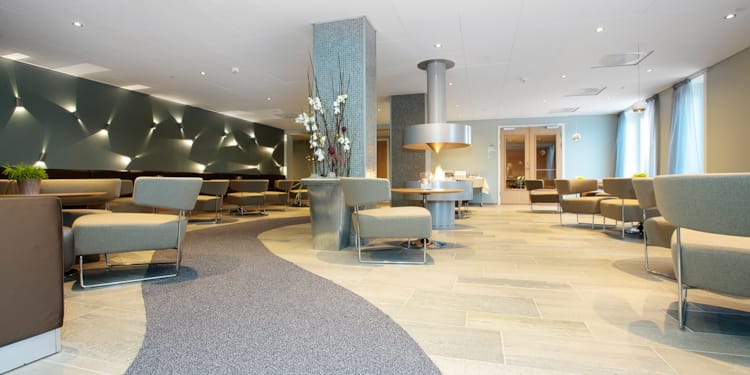 Skeisalongen lounge with seating areas at Thon Hotel Surnadal