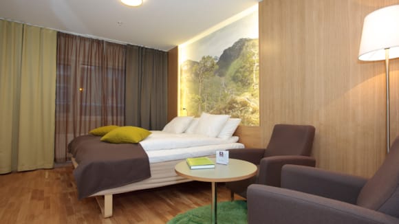 Superior room with separate seating area at Thon Hotel Surnadal
