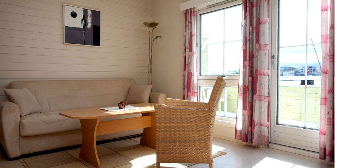 Schlafzimmer im Drei-Zimmer-Appartement im Thon Kystferie Apartments