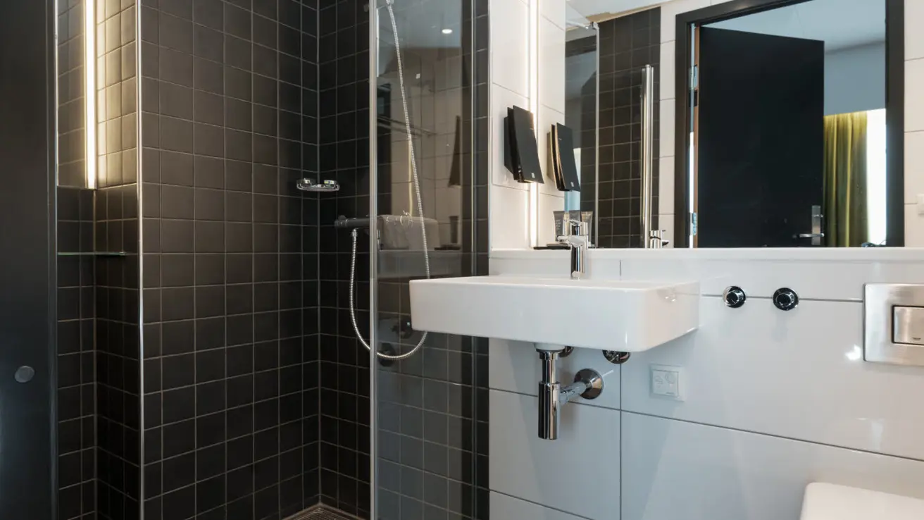 Bathroom with shower and basin.