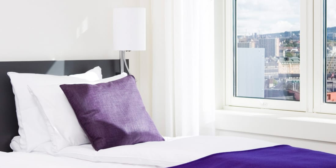 Bett im Superior-Appartement im Oslo Panorama Apartments
