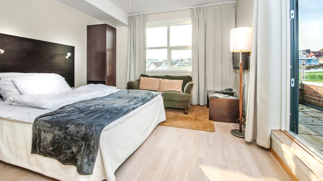 A bedroom in an apartment with two bedrooms, Sandnes Apartments