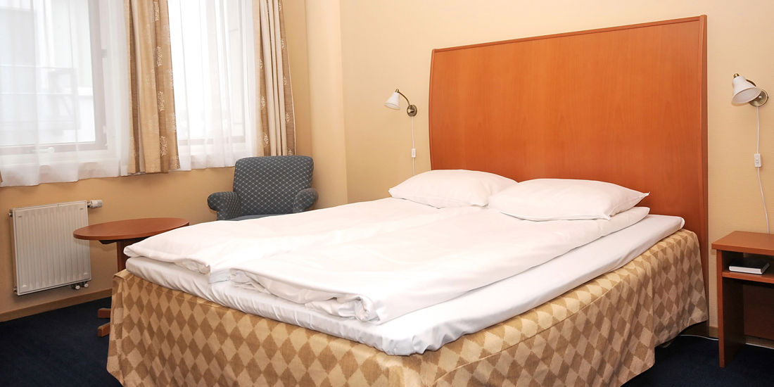 Bed in tweekamerappartement van Thon Hotel Maritim Apartments
