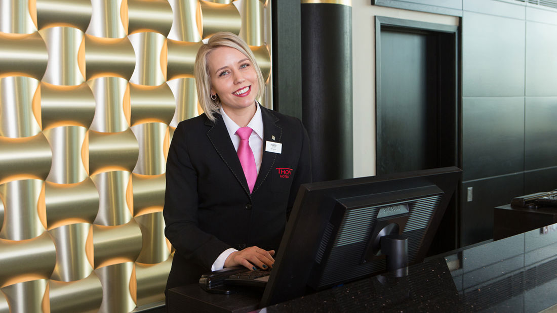 A receptionist at Thon Hotel Opera