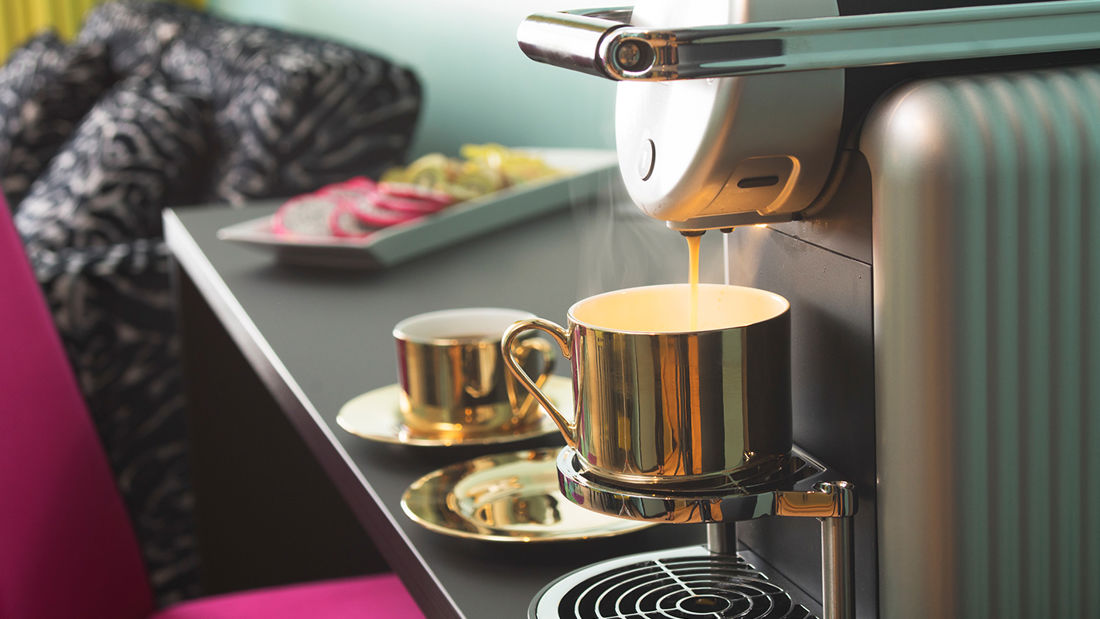 A coffee maker in a hotel room