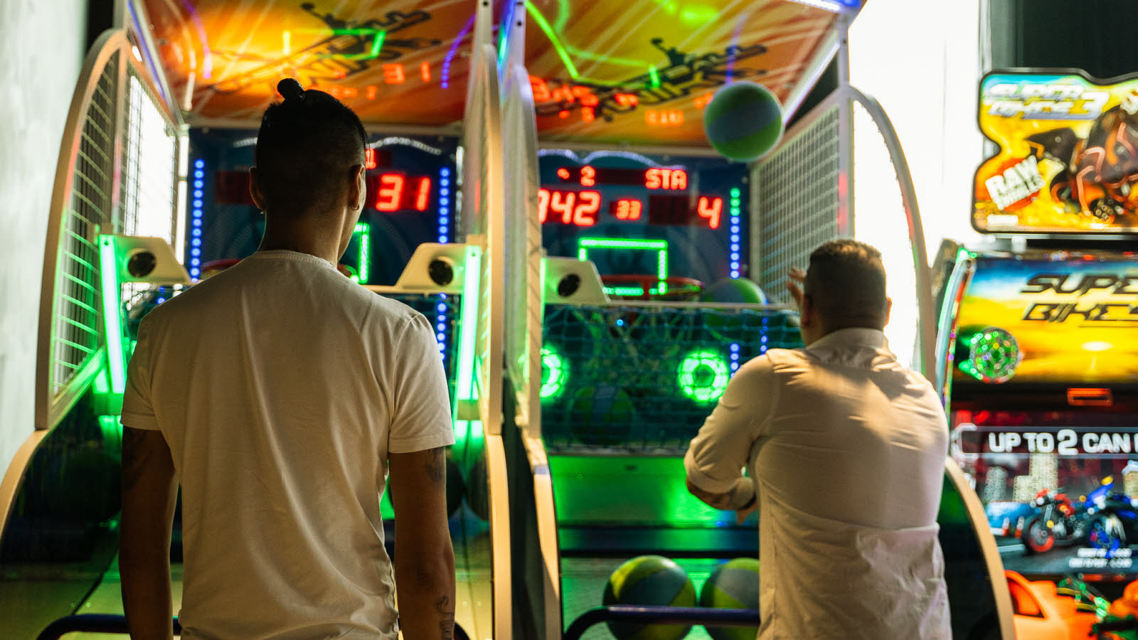 Man in T-shirt bowling