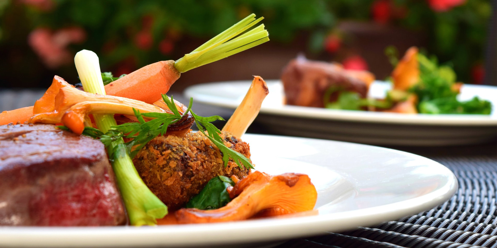 Dinner plate with steak and side dishes